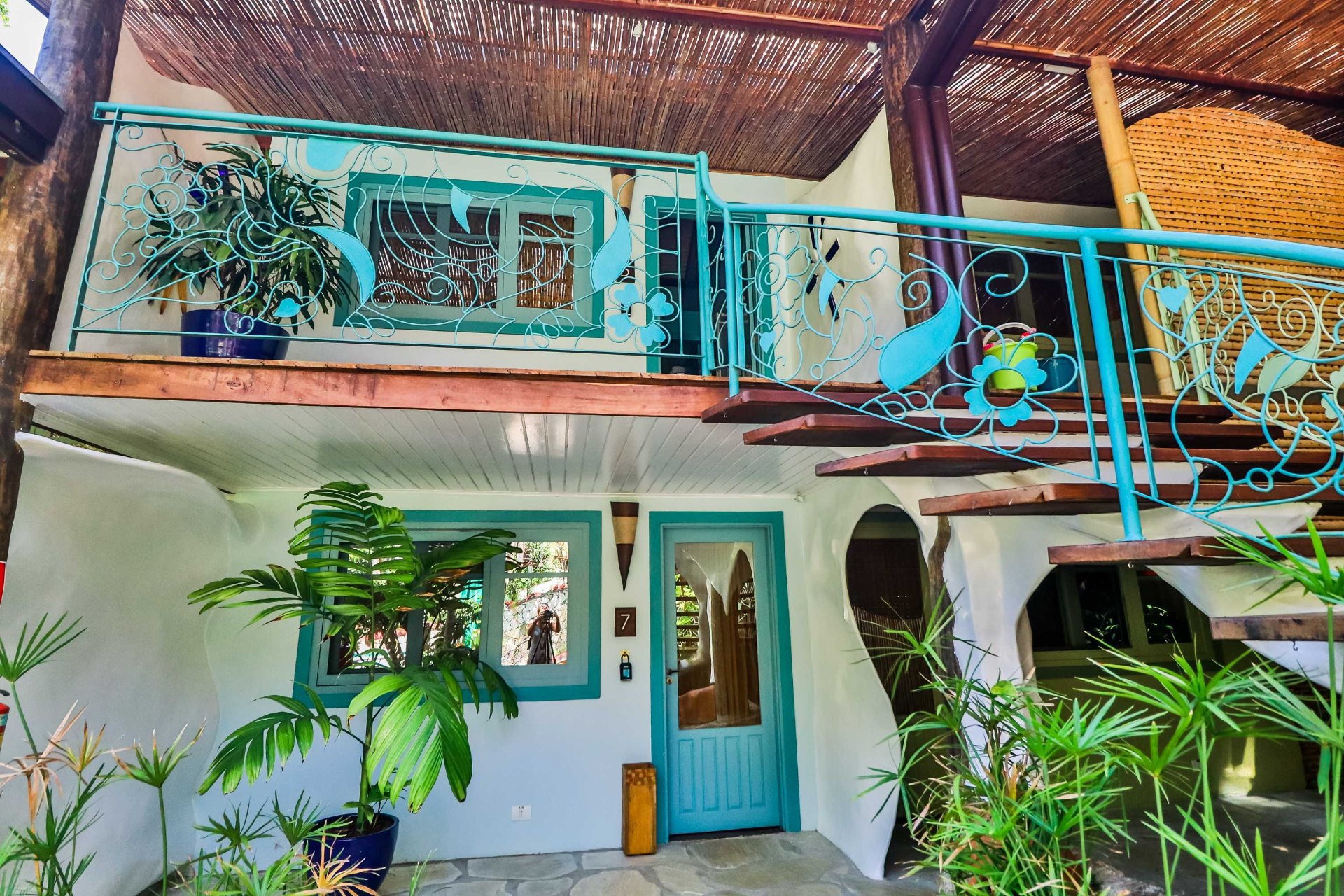 Suite exterior with turquoise balcony